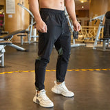 Aidase 2024 Summer Thin Style Ice Silk Fabric Motion Trousers Man Solid Color Elastic Waist Quick Drying Loose Bodybuilding Sweatpants