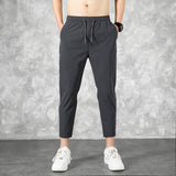 Korean Ice Silk Men'S Summer Thin Fashion Brand Loose And Versatile Quick Dry Casual Pants 9-Point Sports Trousers Boy aidase-shop