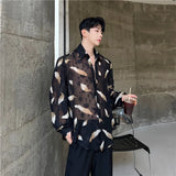 Aidase Men Sexy Feather Hollowed Out Shirt Men's Lapel Long Sleeved Transparent Clothing Streetwear Casual Loose Trendy Design Tops