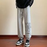 AIDASE  -  American Letter Print Casual Pants Fall Trend Large Size Drawstring Leg Sweatpants Loose Sports Casual Pants Women Men Clothing