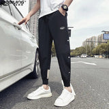 AIDASE  -  Stylish Men's Spring-Autumn Snap Closure Casual Pants with Trendy Matching, Slim Fit, and Color-Block Harem Style aidase-shop