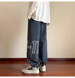AIDASE  -  American Letter Print Casual Pants Fall Trend Large Size Drawstring Leg Sweatpants Loose Sports Casual Pants Women Men Clothing aidase-shop