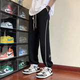 AIDASE  -  Trendy Version Personalized Street Fashion Loose Casual Pants Men's Patchwork Pocket Striped Drawstring Straight Sports Trousers aidase-shop