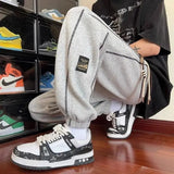 AIDASE  -  Trendy Version Personalized Street Fashion Loose Casual Pants Men's Patchwork Pocket Striped Drawstring Straight Sports Trousers aidase-shop