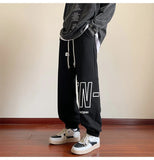 AIDASE  -  American Letter Print Casual Pants Fall Trend Large Size Drawstring Leg Sweatpants Loose Sports Casual Pants Women Men Clothing aidase-shop