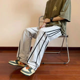 AIDASE  -  Summer Stripe Quick Drying Casual Pants Men Solid Patchwork Embroidery Elastic Waist Drawstring Pocket Loose Straight Trousers aidase-shop