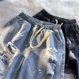 AIDASE  -  Men's New Style Loose Street Hip-hop Paint Point Five-point Ripped Denim Shorts aidase-shop