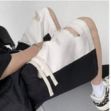 AIDASE  -  New Men's Spliced five-point Design Sense Casual Irregular Ripped Tool Shorts aidase-shop