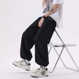 AIDASE  -  Ice Silk Men Casual Pants Loose Summer Thin Quick Drying Sports Solid Casual Draping Wide Leg Pants Preppy Hip Hop Trousers aidase-shop