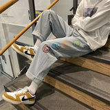 Colorful Smiley Printed Black Jeans for Mens Straight Leg Denim Pants Teen Hip Hop Clothing Oversized Baggy Trousers Streetwear aidase-shop